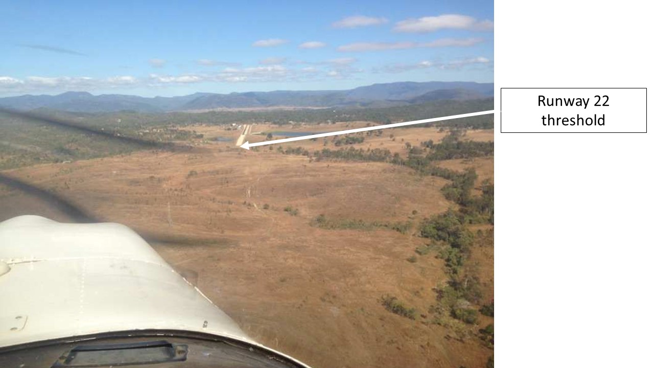 Figure 3: Approach to runway 22 at Lakeside Airpark. Note the unsealed and sealed portion of the runway. Also, note the difficulty in detecting the power lines on approach. Photo taken about a week prior to the accident